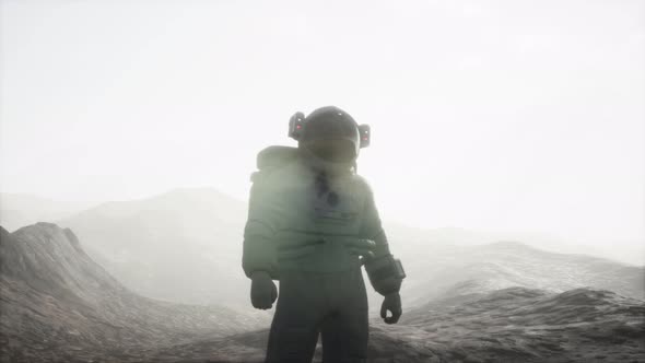 Astronaut on Another Planet with Dust and Fog alt