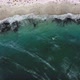 Top down view of a kite surfer riding some waves at Camps Bay beach - VideoHive Item for Sale