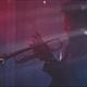 A trumpeter in a dark room with neon light and smoke - VideoHive Item for Sale