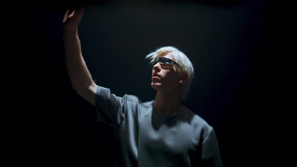 Man Using Vr Headset in Dark Room Light