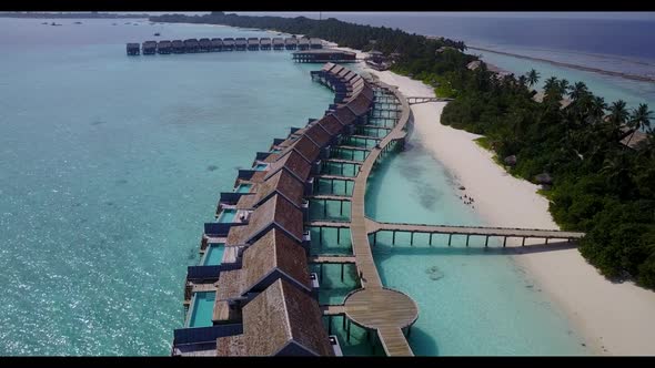 Aerial above landscape of tropical bay beach lifestyle by blue water and clean sand background of a 