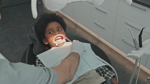 Boy Getting his Cavity Treatment Finished