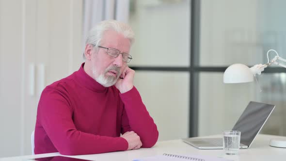 Sleepy Old Man Taking Nap at Work