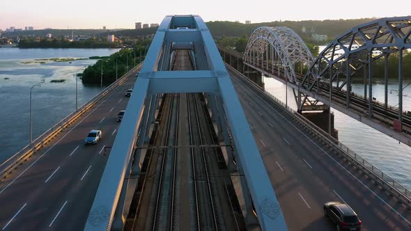 Top View of River Bridge with Railways and Highway Roads