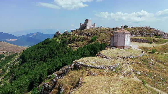 Aerial View of Ancient Castle on Mountain Hill Pine Forest on Mountain Slope