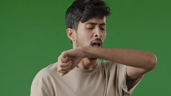 Sick Allergic Arab Man Indian Male Unwell Guy Sneeze Cover Face By Hand Prevent Spread Viral