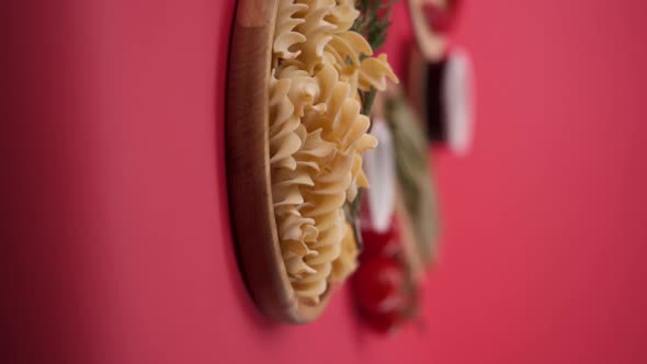 Vertical video: Pasta and spaghetti in a plate