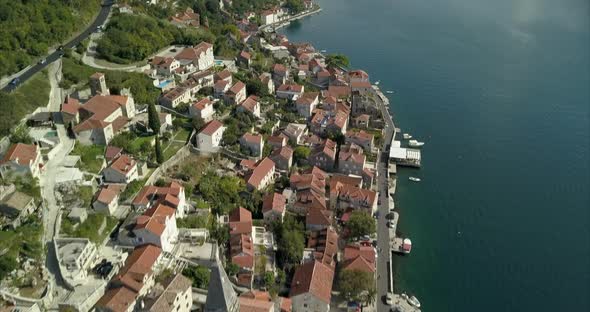 Perast in montenegro. incredible coastal town filmed from the air during sunny day