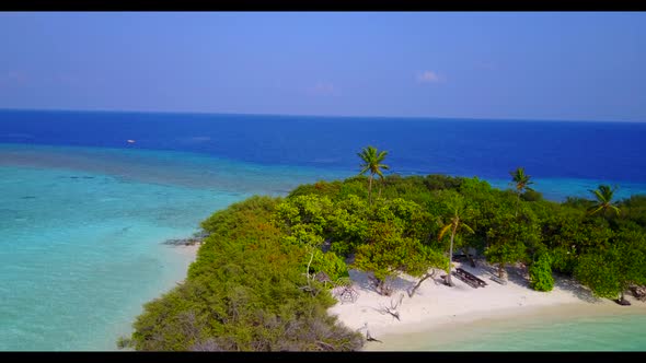 Aerial drone view sky of luxury lagoon beach holiday by blue sea and bright sand background of a day