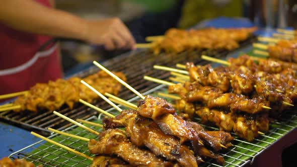 Street Food in Asia. Traditional Dishes of Street Cuisine. Night Food Markets