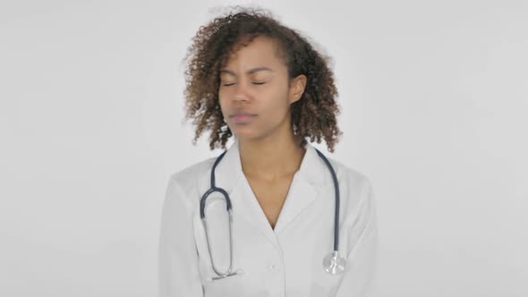 African Female Doctor Showing No Sign By Shaking Head on White Background