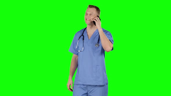 Doctor Having Call Using Cell Phone. Green Screen
