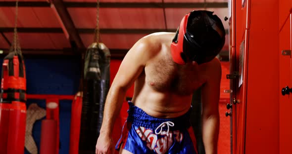 Male boxer wearing headgear