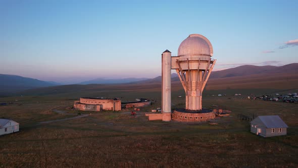 Two Large Telescope Domes at Sunset