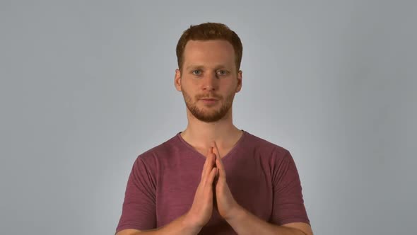 Ginger Male Shows Sign Namaste