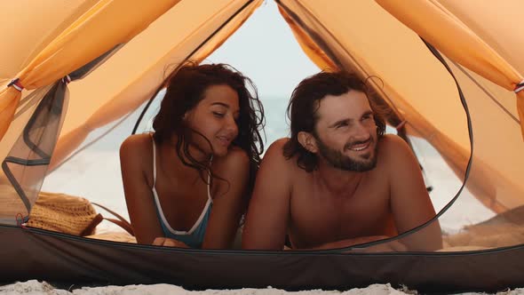 Couple on the Beach in a Tent