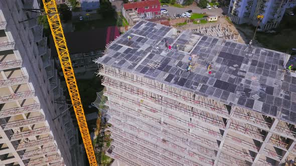 construction site of residential building with workers. monolithic construction.