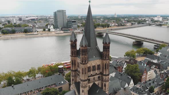 4k drone footage circling the historical Great Saint Martin Church of Cologne, Germany.