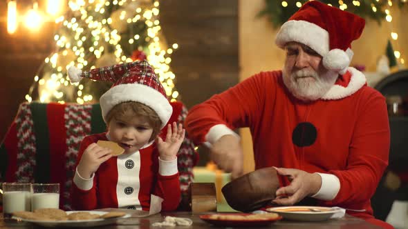 Santa Grandfather with Little Kid Boy Prepare Christmas and New Year, Baking Christmas Cookies