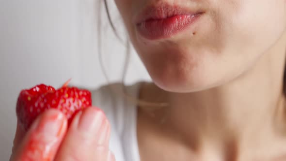 Closeup Woman Appetizing Eating Strawberry
