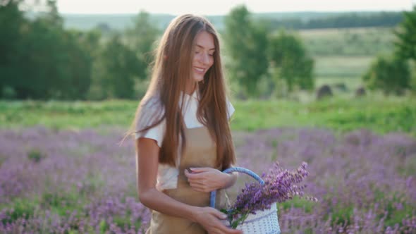 Smiling Girl Walking with Basket Lavender Patches