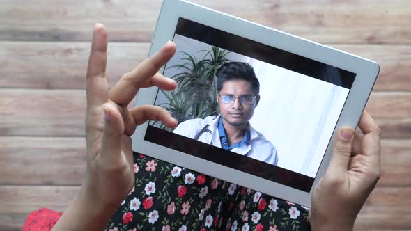 Online Consultation with Doctor on Digital Tablet 