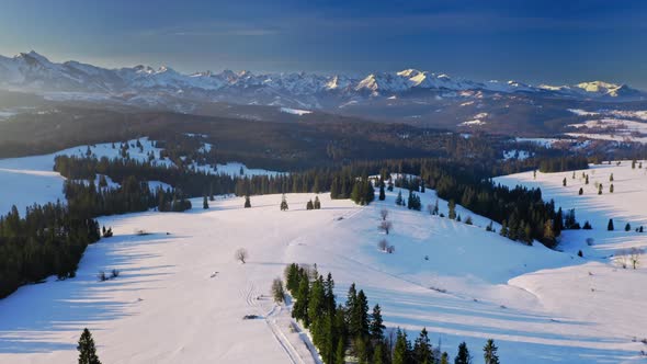 Aerial view of sunrise in Tatra mountains at winter