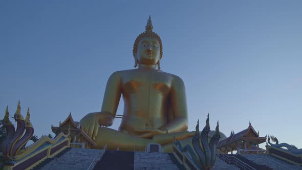 The World's Largest Buddha Statue In Twiliin Front Of The World's Largest Buddha Statueht