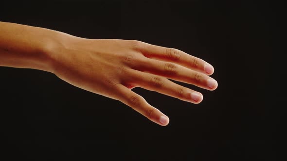 Shaking Hand Nervous Trembling Black Skin Texture Closeup Palm on Black Background