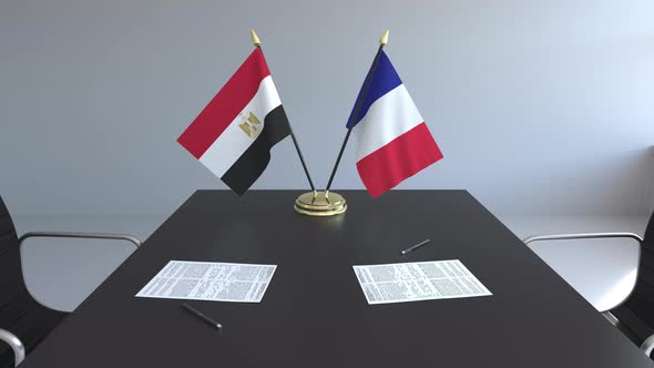 Flags of Egypt and France on the Table alt