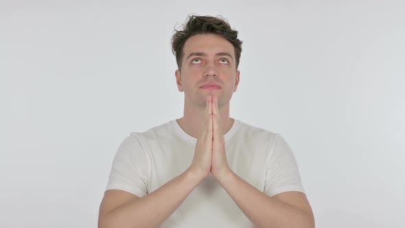 Praying Young Man Wishing to God on White Background