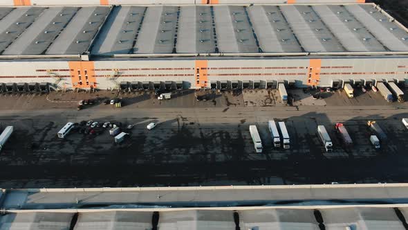 Motion Above Large Industrial Factory Backyard Parking