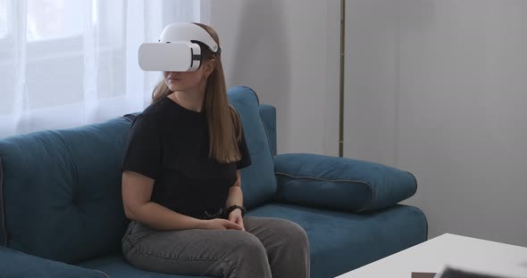 Woman Is Viewing Project of Interior of Apartment By Modern Technology of Vr Wearing HMDdisplay