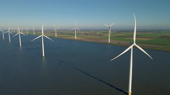 Windmill Park in the Ocean Drone Aerial View of Windmill Turbines Generating Green Energy Electric