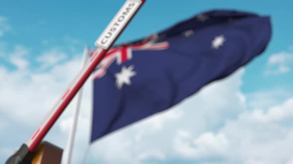 Closed Boom Gate with CUSTOMS Sign at the Australian Flag