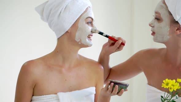 Beautiful Woman Having a Facial Treatment at Spa