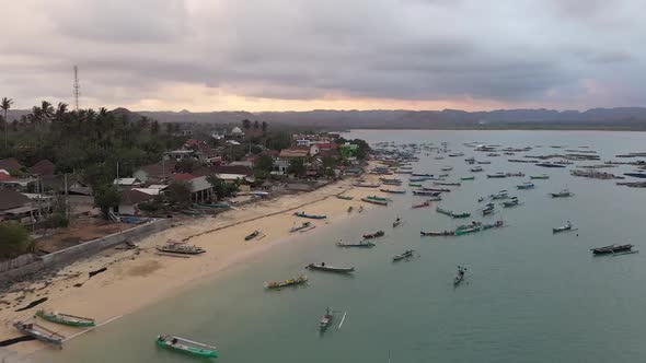 Fishing Boats And Wooden Jetty In Gerupuk, Quiet Fishing Village On South Coast Of Lombok Island In