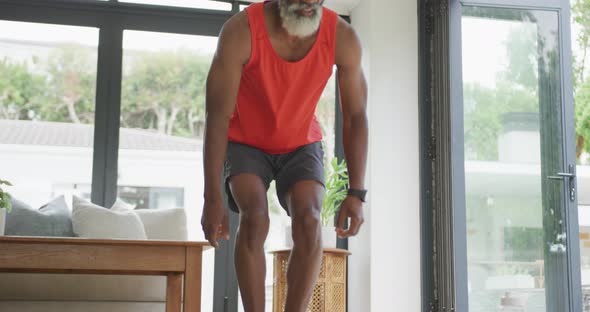 Video of african american senior man practicing at home