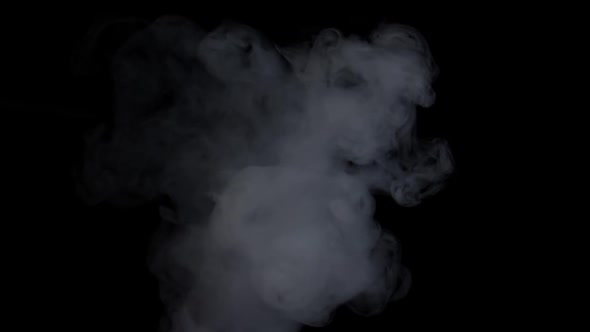 White Smoke Exploding Over The Black Background