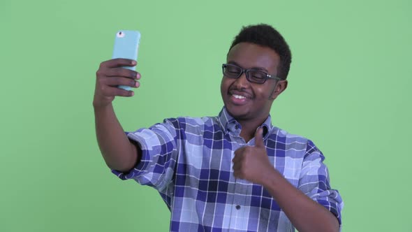 Happy Young African Hipster Man Taking Selfie