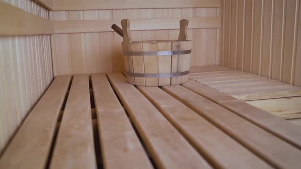 Sauna with a Wooden Basin