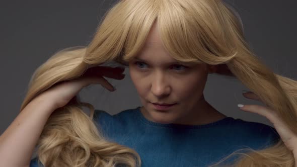 Nordic Blond Model in Studio with Dramatic Top Light