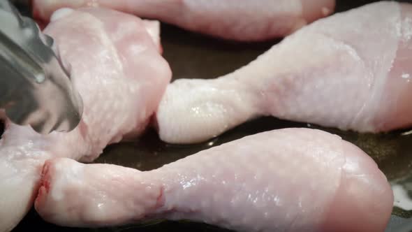 Chef Cooking Chicken In Frying Pan