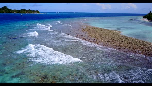 Aerial drone shot travel of exotic island beach journey by transparent water and clean sandy backgro