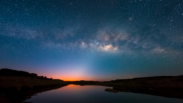 4K Time lapse of milky way and sunrise over Sam Pan Bok canyon, Ubon ratchathani, Thailand 