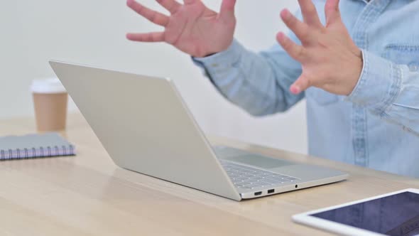 Man Typing On Laptop Angrily Close Up