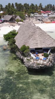 Tanzania  Vertical Video House on Stilts in the Ocean on the Coast of Zanzibar Slow Motion