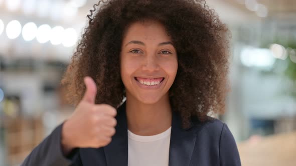 Positive Young African Businesswoman Doing Thumbs Up 
