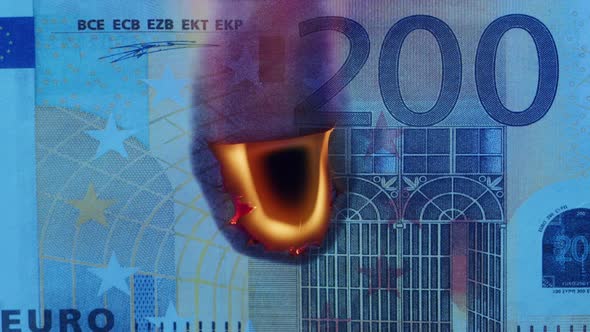 Burning of 200 Euro Banknote on Black Bacground Closeup