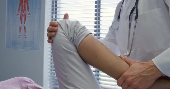 Physiotherapist at work in a hospital alt